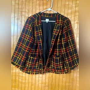 This is a size large Harris tweed jacket